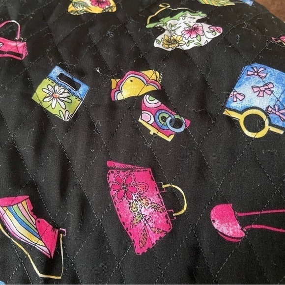 Quilted jacket by requirements with purses galore all over on a field of black. - Picture 5 of 5